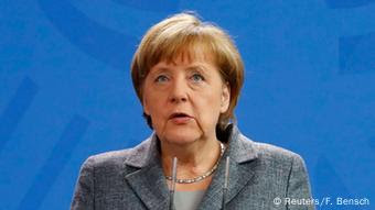 German Chancellor Angela Merkel gives a statement on Turkey's request to seek prosecution of German comedian Jan Boehmermann 