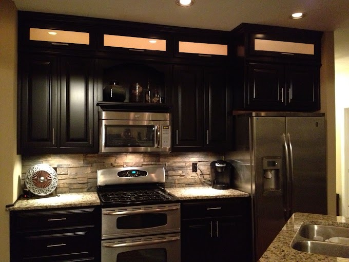 Espresso Backsplash Ideas For Dark Cabinets And Light Countertops - Espresso Cabinets Light Granite Stacked Rock Backsplash With In Cabinet And Under Cabinet Lighting Stone Backsplash Beadboard Backsplash Brick Backsplash - This will prevent the cabinets from looking like the sad loner in the room.