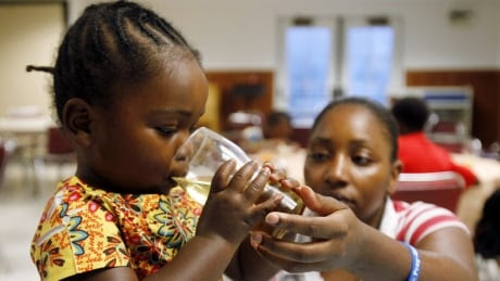 Girl drinks apple juice