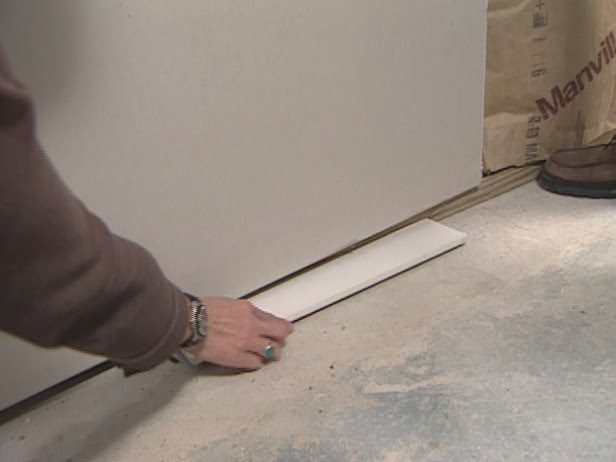 How much gap to leave between basement concrete floor and ...
