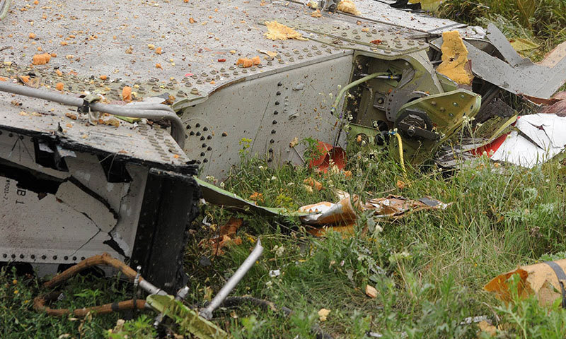 Flight MH17 hit by numerous 'high energy objects' - World ...