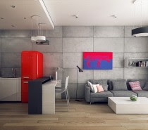 The open design here allows the color scheme from the kitchen - grey concrete with pops of red - to spill over into the living room, making the whole space feel unified.