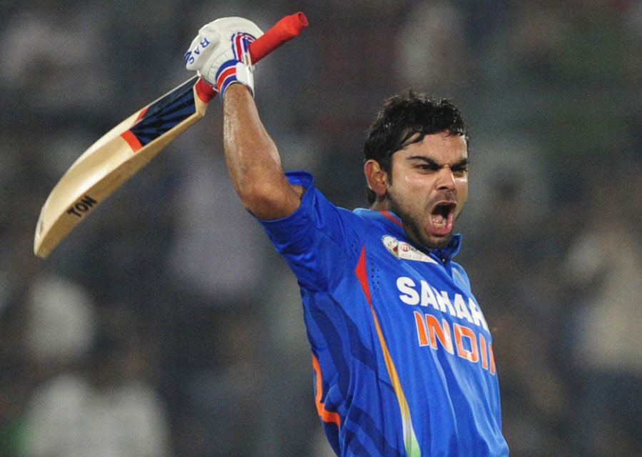 Virat Kohli celebrates his century 