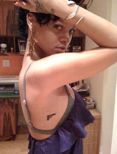 Rihanna Gun Tattoo. Rihanna has been keeping a low profile in recent times 