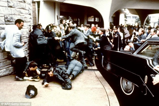 Chaos: On March 31, 1981, Hinckley opened fire on Reagan outside the Hilton Hotel in Washington DC. The president was hit under the arm and the bullet missed his heart by an inch