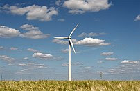 Modern wind energy plant in rural scenery.