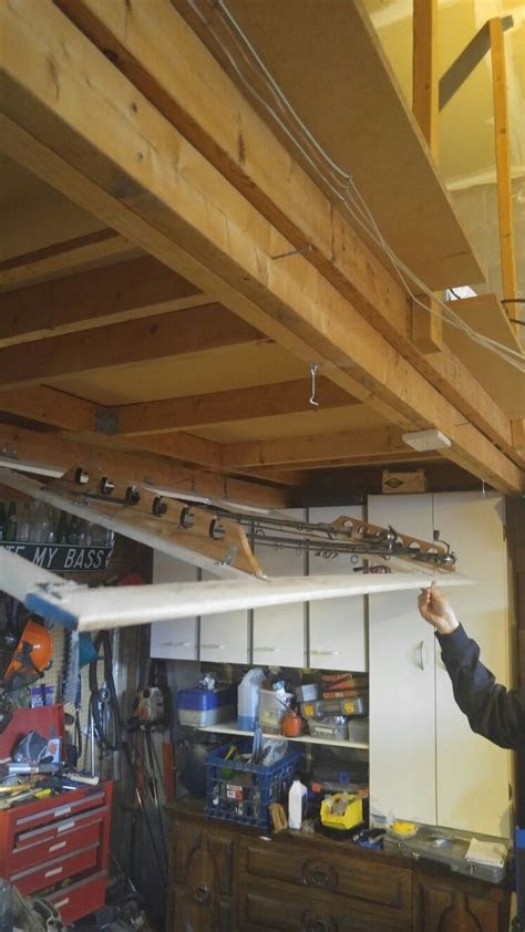 fishing rod storage  garage ceiling storage ideas