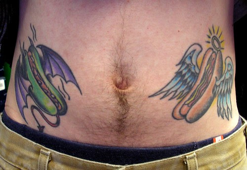 Jeff's good and evil hot dog tattoos guide his life.