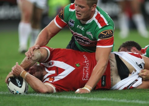 Great Pic! NRL season just around the corner
giantsorcowboys:

Rugby Rules #26
Modesty Shall Never Prevent You From Dropping the Egg!
Jack Bosden puts this Rule into effect, as he scores a try for the St George Illawarra Dragons, while Sam Burgess’s brother, George, of the Rabbitohs tries to prevent it!
Great tattoo on him, too!
