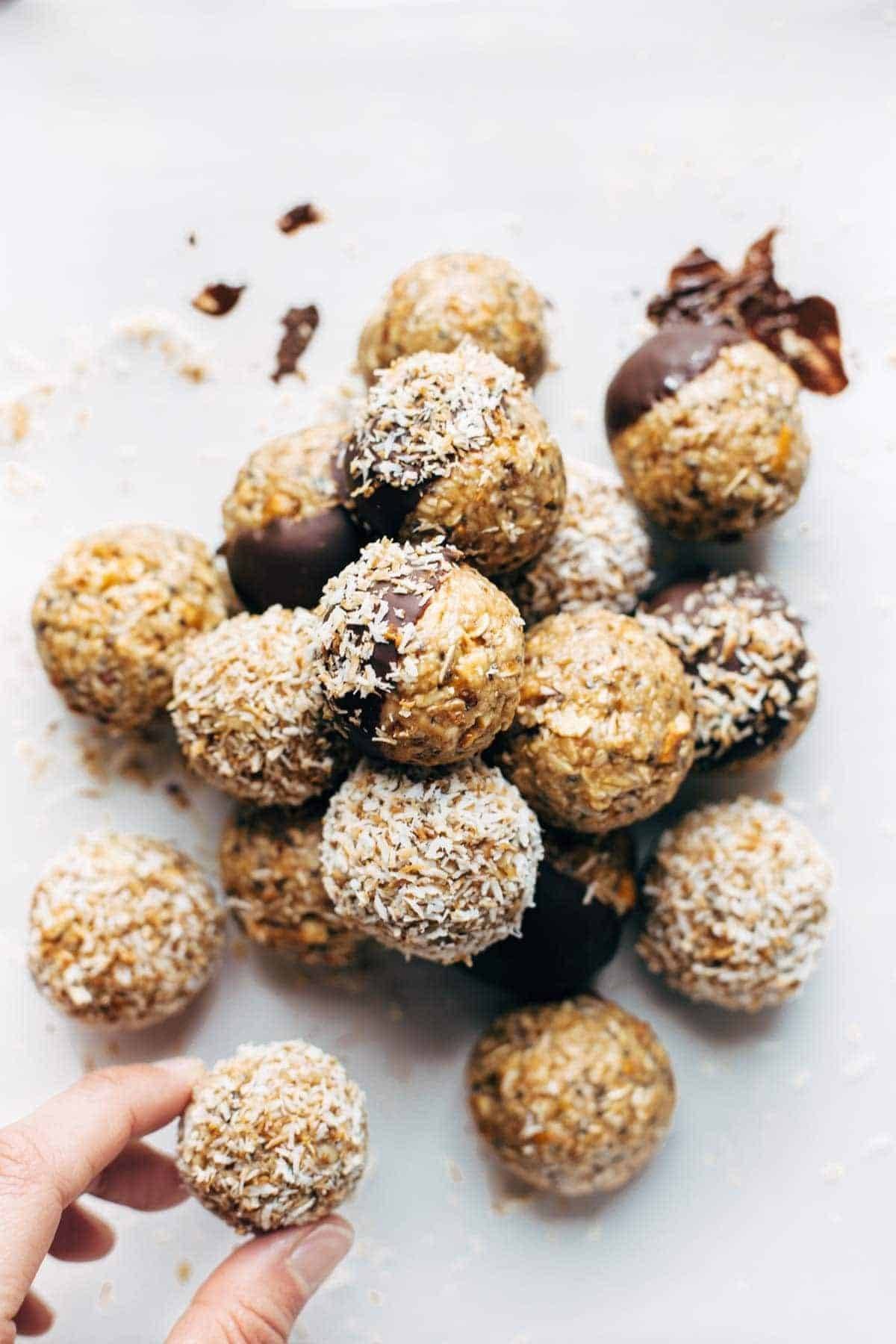 Energy Bites! Easy no-bake recipe with real food like oats, chia seeds, peanut butter, and coconut. Stays soft and yummy for weeks in the fridge! | pinchofyum.com