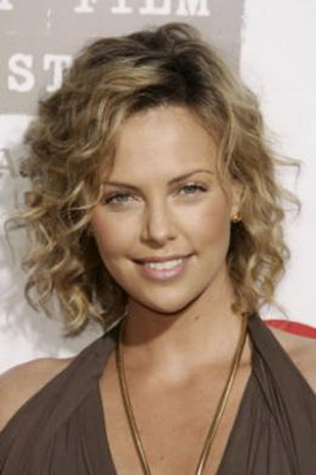 medium length curly hairstyle 2011 with layers for girls. See all 18 