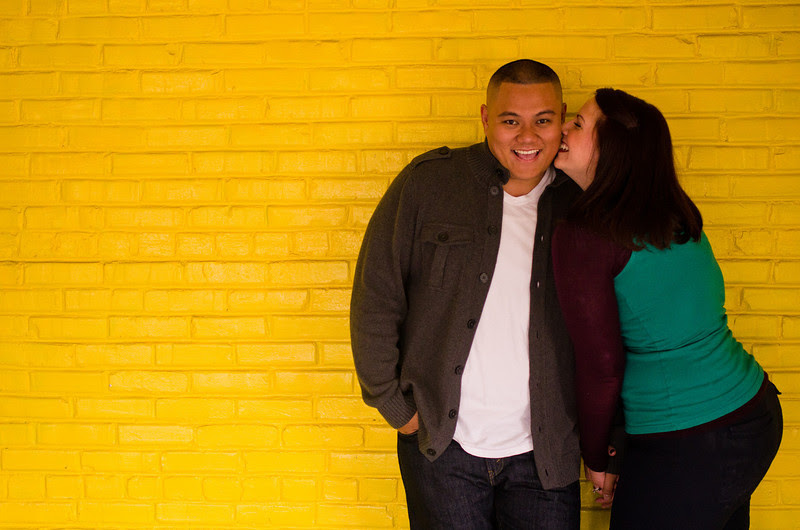 Couple inside the Prairie St. Brewhouse, in Rockford, Il during an engagement portrait photo session.