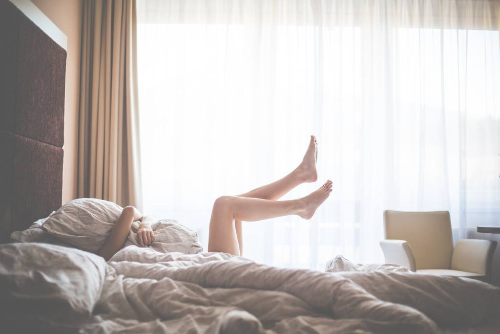 beautiful-woman-enjoying-morning-relax-in-bed-picjumbo-com