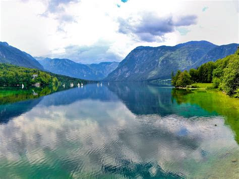 mountains lake bohinj slovenia clouds nature landscape photography  wallpaper