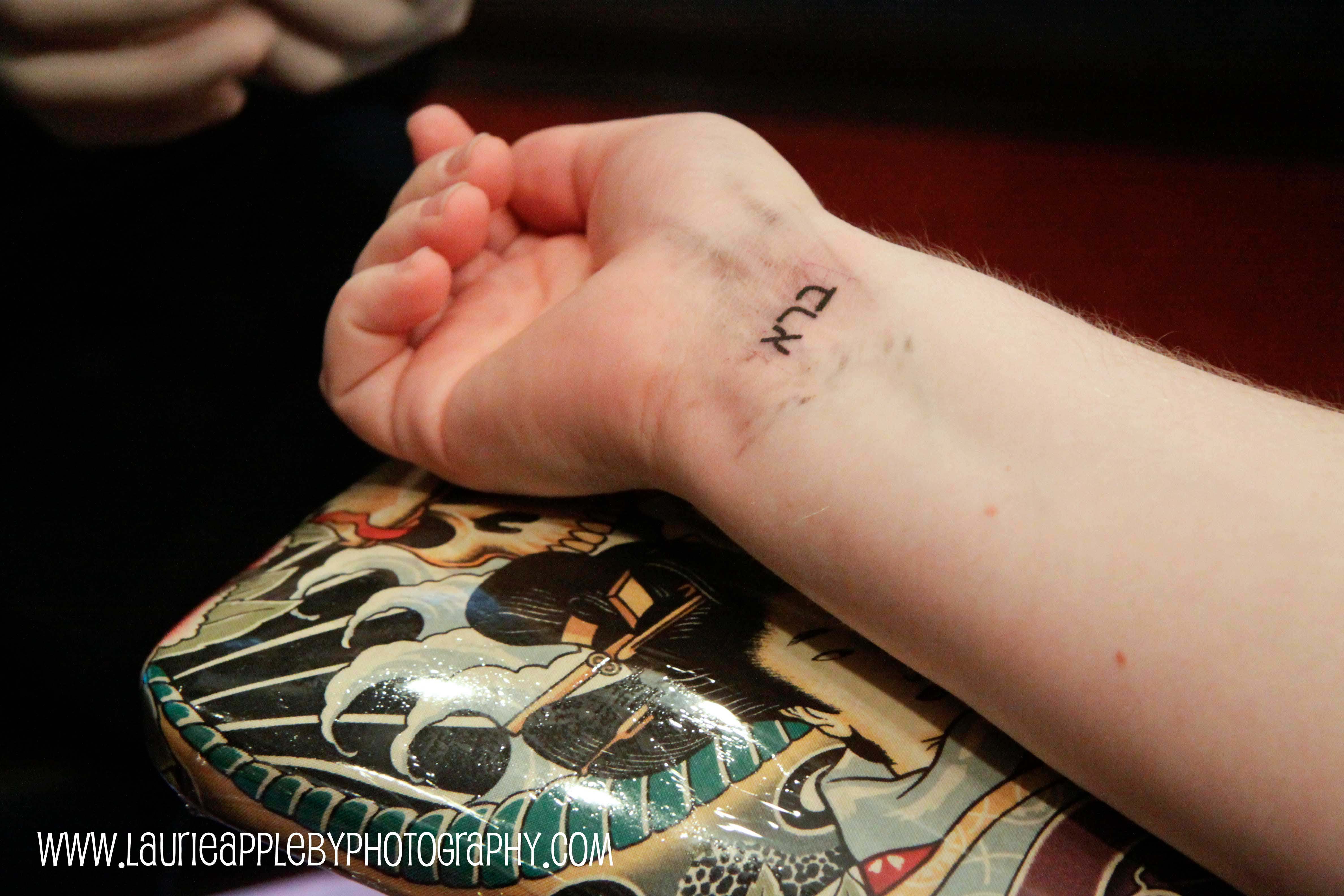 Her tattoo is Hebrew meaning