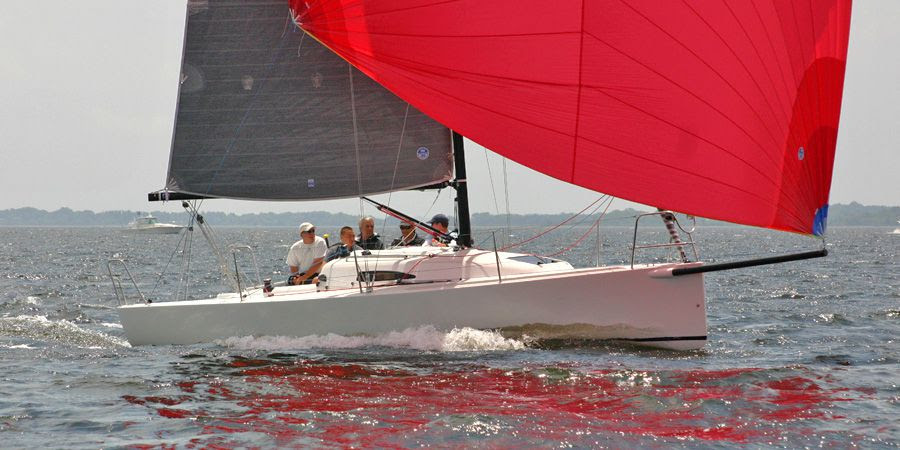 J/88 sailing downwind under spinnaker