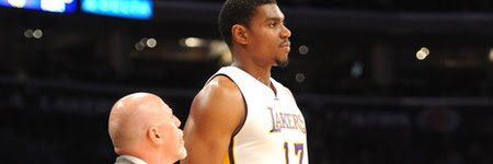 April 1, 2012; Los Angeles, CA, USA;    Los Angeles Lakers trainer Gary Vitti talks to Andrew Bynum (17) on the court in the first quarter of the game against the Golden State Warriors at the Staples Center.  Bynum suffered an ankle sprain and did not return to the game. Mandatory Credit: Jayne Kamin-Oncea-US PRESSWIRE