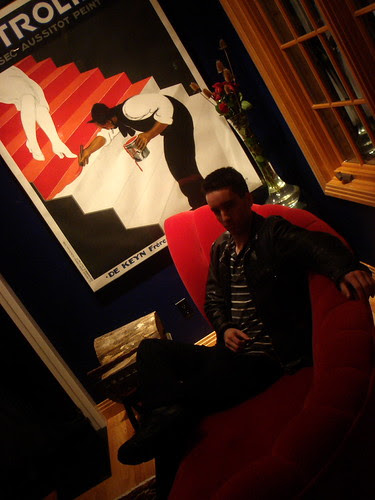 Portrait of Chris on the red settee