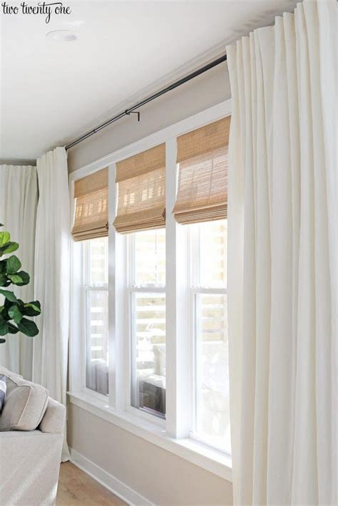 A standard shower curtain is typically 72 inches long, so the curtain rod should be installed around 75 to 77 inches from the floor. Budget-Friendly Living Room Window Treatments | Window