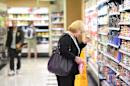 A woman shops in a supermarket in Sydney, Australia, which is to strengthen food labelling laws after a series of hepatitis A infections were linked to frozen berries from China