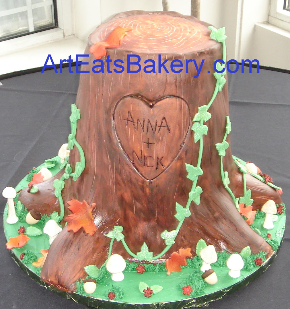 Fondant tree stump custom wedding cake design with leaves, mushrooms and ivy.jpg