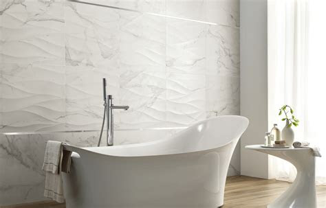 Old world master bathroom with carrara marble floor. Calacatta Vintage Series | Porcelain | Olympia Tile