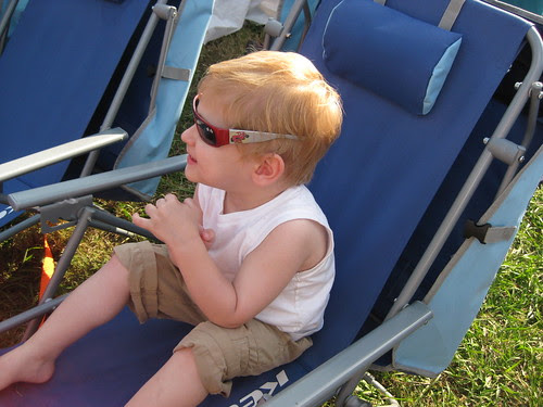 nicolas relaxes at jazzfest