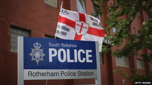A new dawn? An EDL flag flies outside Rotherham Police Station