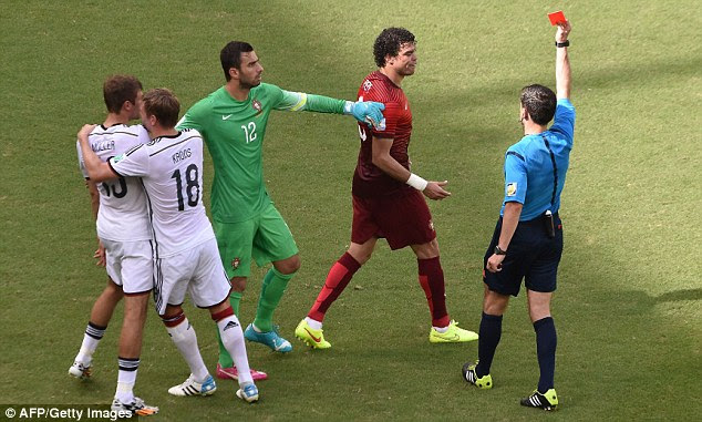 Off you go: Pepe (second right) is sent off as                  Muller (left) is held back by team-mate Toni Kroos