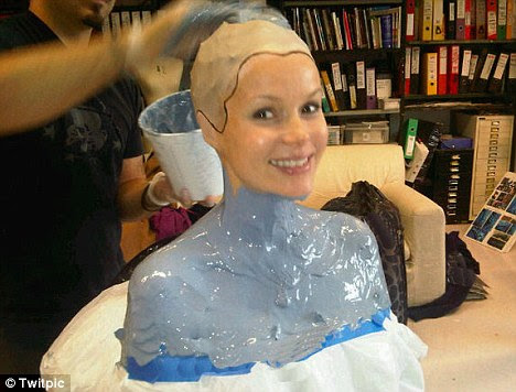 Not a great look! Amanda Holden posted a picture of herself being measured for her Shrek: The Musical fat suit on Twitter