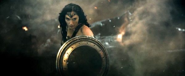 Wonder Woman deflects Doomsday's blast with her shield in BATMAN V SUPERMAN: DAWN OF JUSTICE.