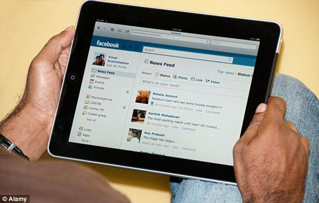 Researchers in Washington DC and New Jersey say Facebook (stock image shown) and Twitter are stifling people's opinions. In the study they found typical users were afraid to voice their opinions offline. They call this the 'spiral of silence' phenomenon where people shy away from discussing controversial topics
