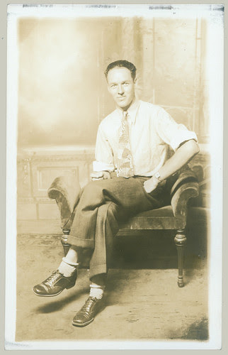 Man with rolled down socks.
