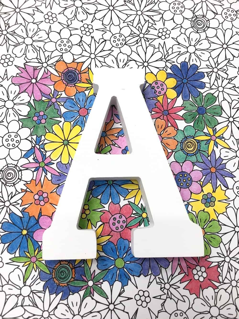 Coloring book DIY name plaque - Mod Podge Rocks
