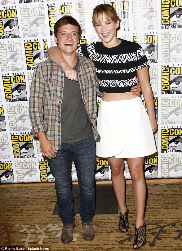 Old pals: Jennifer Lawrence got chummy with her Hunger Games co-star Josh Hutcherson at Comic Con in San Diego, on Saturday