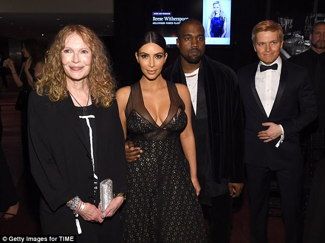 Altogether now: Mia, Kim, Kanye and Ronan Farrow posed for a group shot together
