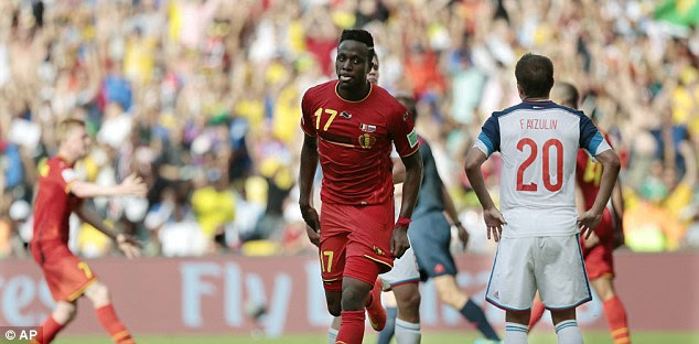 Delighted: The 19-year-old striker wheels away in celebration after scoring the only goal of the game