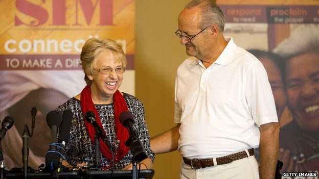 Nancy Writebol, the SIM USA missionary who recovered from Ebola Virus Disease contracted in Liberia addresses the media as her husband David looks on at a news conference at the SIM USA headquarters on September 3, 2014 in Charlotte, North Carolina.
