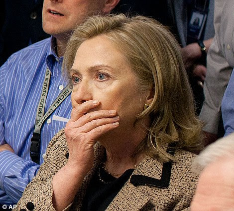Shock: Hilary Clinton, U.S. Secretary of State, watches the footage