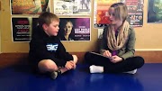 Coach Stella interviews a couple of SBG Montana's students.