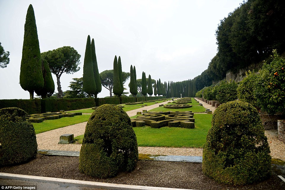 Clash of ideals: Pope Francis has won fans around the world thanks to his modest way of life - and this garden doesn't fit the bill
