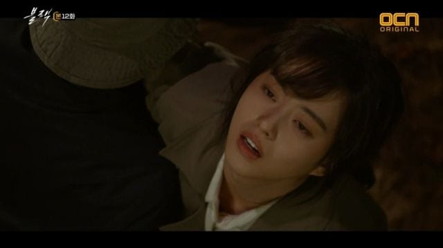 Ha-ram possibly being stabbed by Young-choon