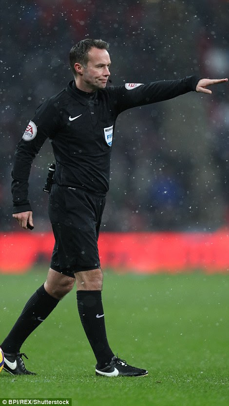 Tierney points to the penalty spot after consulting VAR