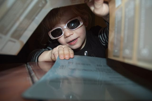 Small Girl Playing at Restaurant [enlarge]
