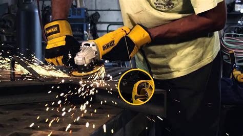 Watch this video for more. THE NEW DWE402 SMALL ANGLE GRINDER BY DEWALT - YouTube