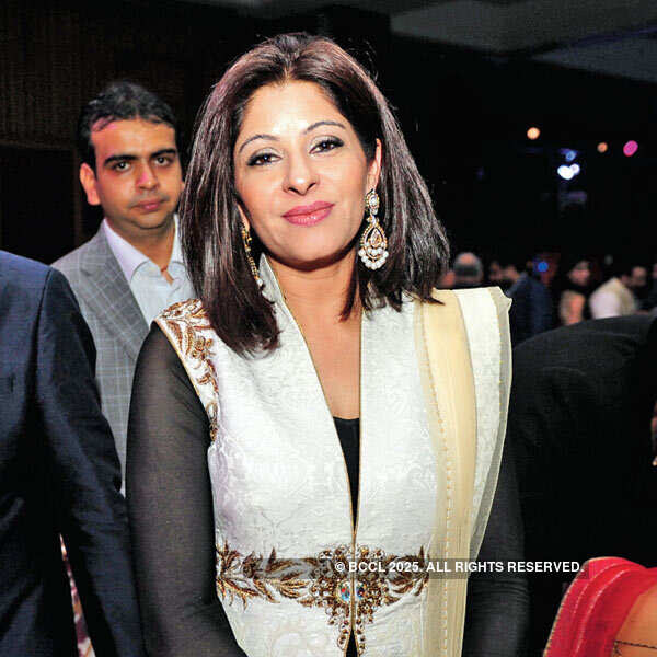 Chandni gets clicked during Roshna's annaprashan ceremony, held in Delhi.