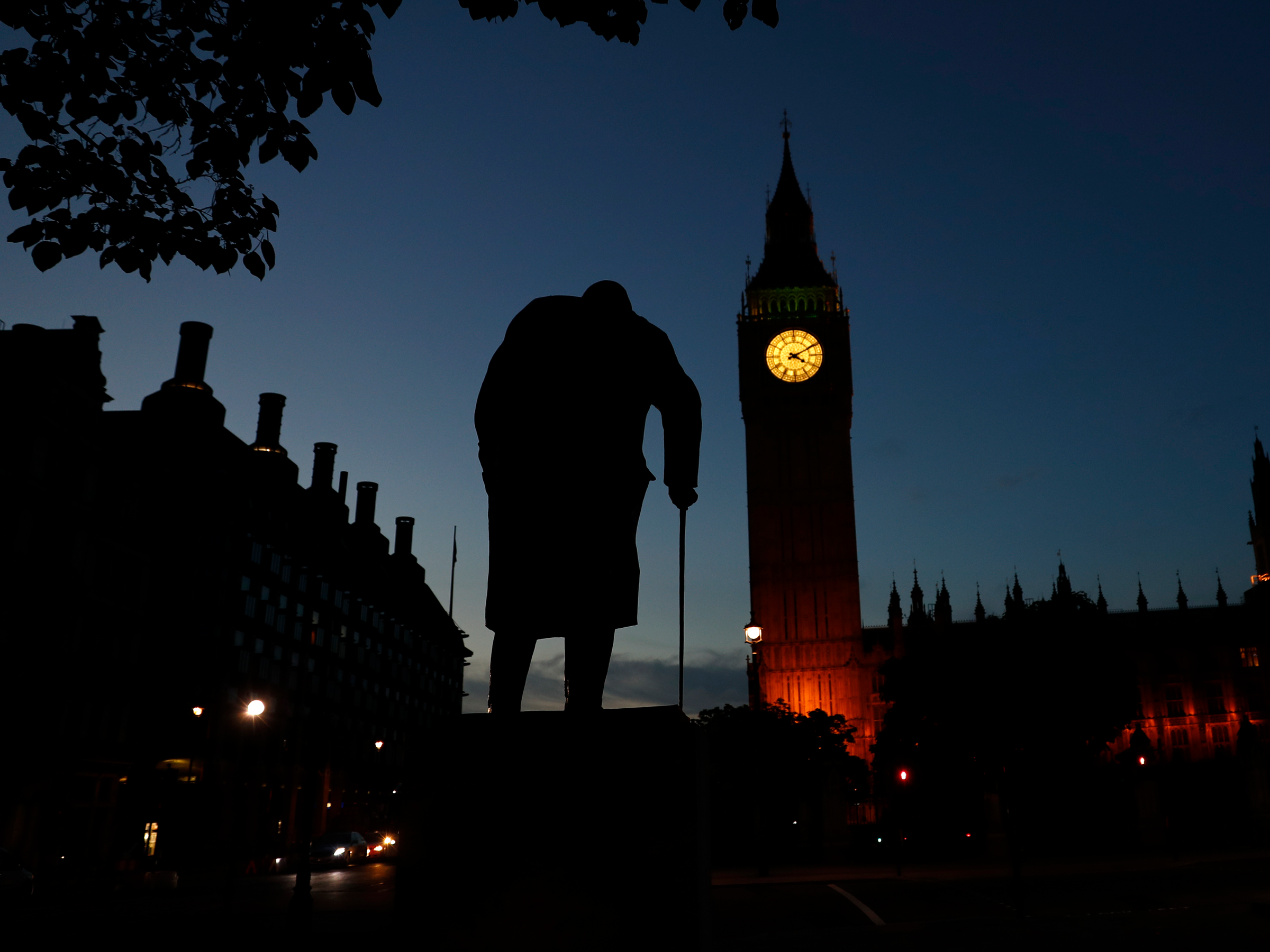 statue of churchill old man walking london