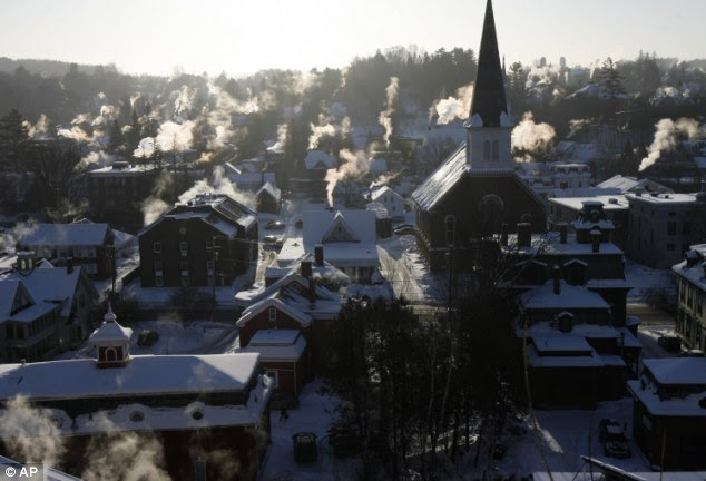 So cold: Steam rises from houses in frozen Montpelier, Vt.