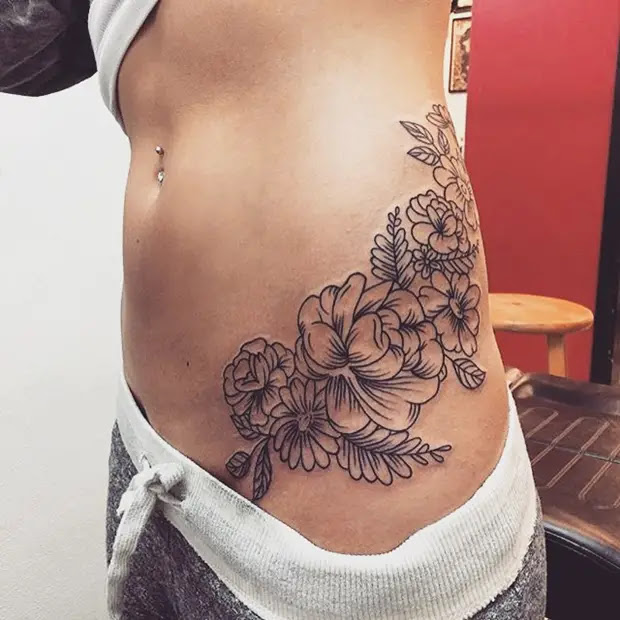 rose rib tattoos for girls