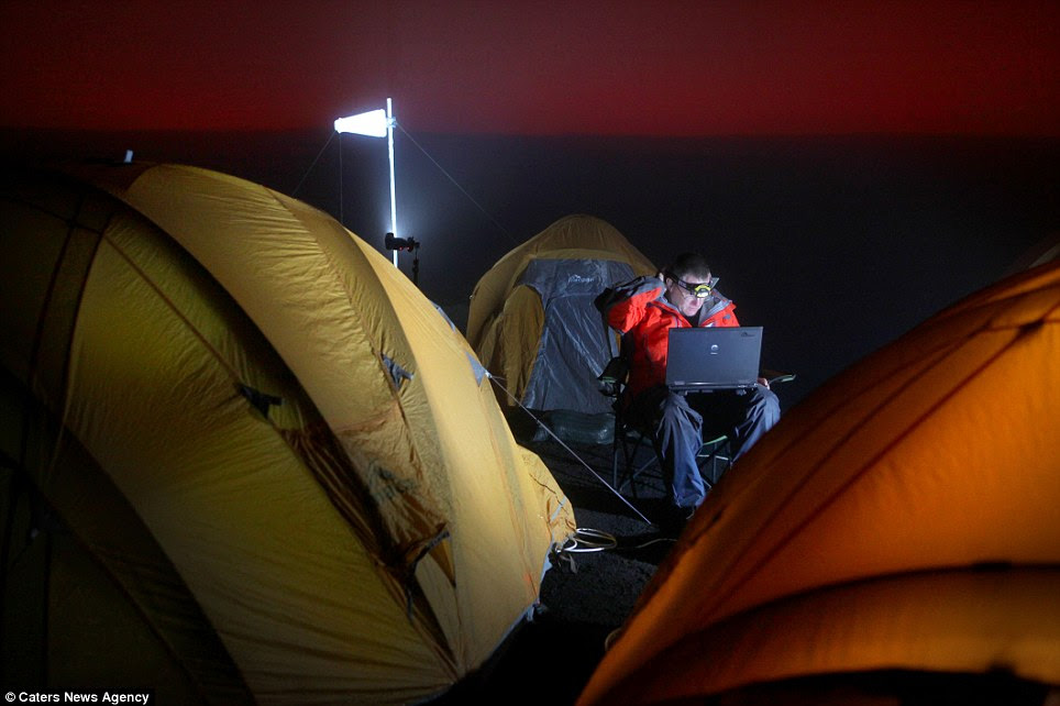 Patience is a virtue: Mr Mackley and his team camped at the summit of the volcano for 38 days with it raining heavily for 33 of them as they waited for right moment to descend into the crater